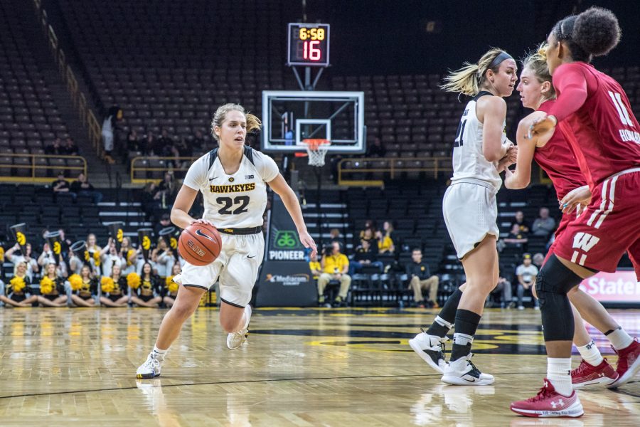 Iowa guard Kathleen Doyle dribbles during a women's basketball matchup between Wisconsin and Iowa on Monday, Jan. 7, 2019. The Hawkeyes defeated the Badgers, 71-53. 