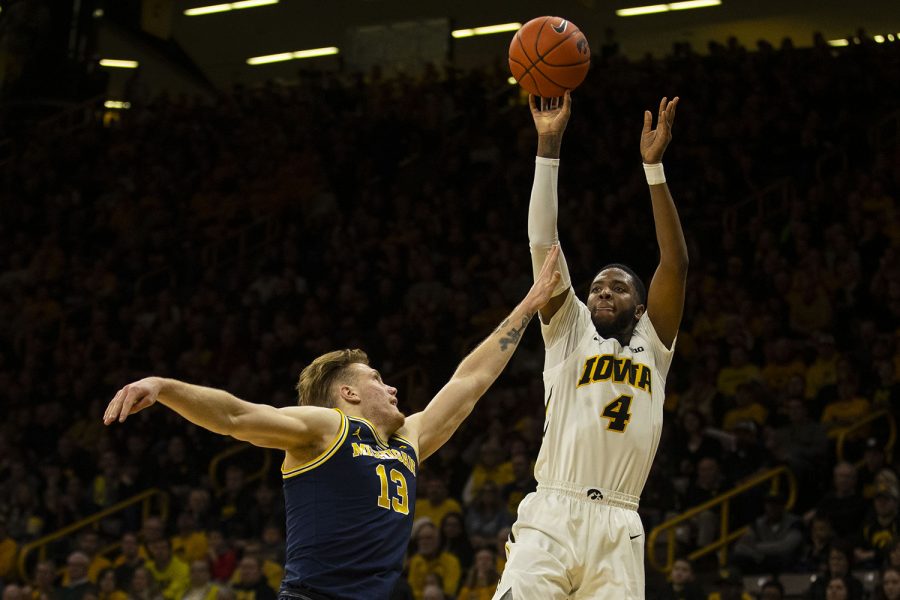 Iowa+guard+Isaiah+Moss+attempts+a+3-pointer+during+the+Iowa%2FMichigan+mens+basketball+game+at+Carver-Hawkeye+Arena+on+Friday%2C+February+1%2C+2019.+The+Hawkeyes+took+down+the+No.+5+ranked+Wolverines%2C+74-59.+
