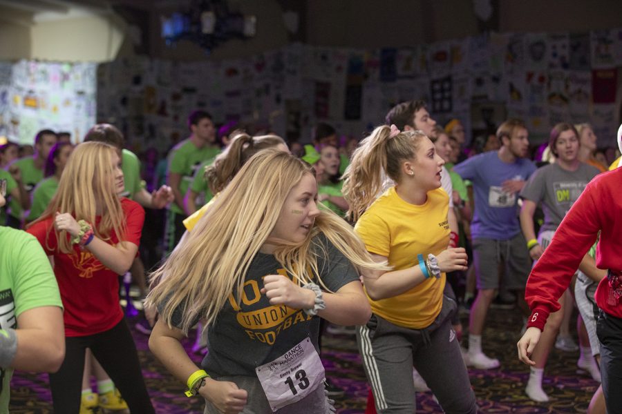 Participants dance in the early morning hours during Dance Marathon 25 at the Iowa Memorial Union on Saturday, February 2, 2019.