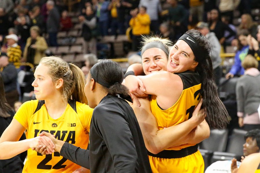Iowa forward Megan Gustafson (10) celebrates with her teammates after a basketball game against Michigan State on Thursday, Feb. 7, 2019. The Hawkeyes defeated the Spartans 86-71. Gustafson led all scorers with 41 points.  (David Harmantas/The Daily Iowan)