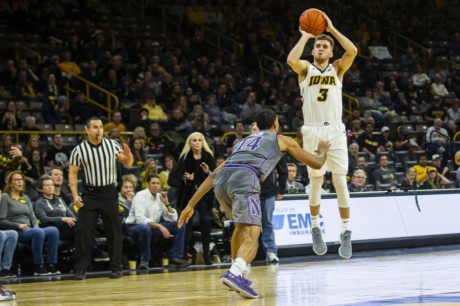 Iowa+guard+Jordan+Bohannon+attempts+a+3-pointer+during+the+Iowa%2FNorthwestern+mens+basketball+game+at+Carver-Hawkeye+Arena+on+Sunday%2C+February+10%2C+2019.+