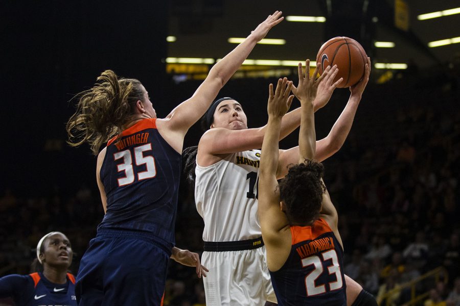 Iowa center Megan Gustafson looks to the basket during the Iowa/Illinois womens basketball game at Carver-Hawkeye Arena on Thursday, February 14, 2019. The Hawkeyes defeated the Fighting Illini, 88-66. 