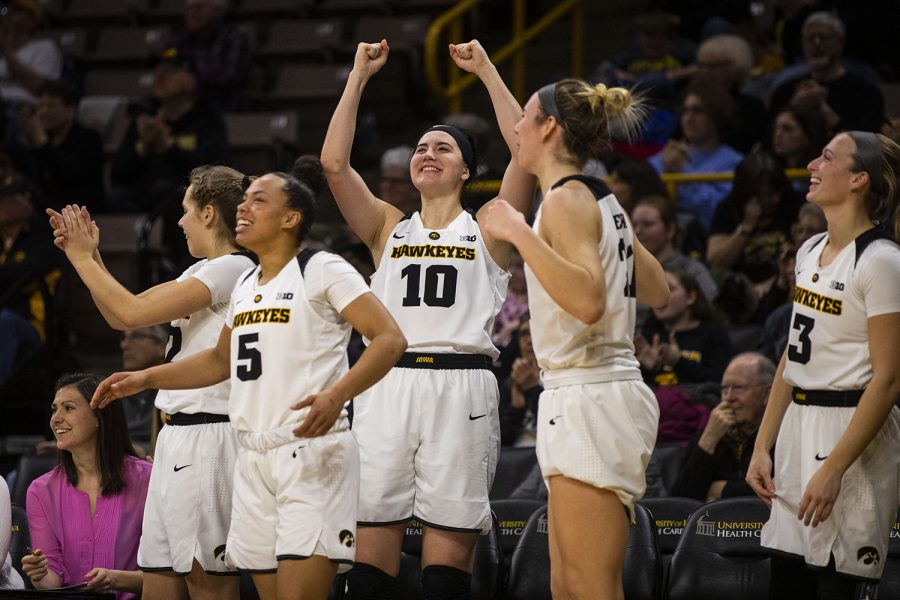 Iowa+players+react+to+Iowa+forward+Monika+Czinano+%28not+pictured%29+scoring+during+the+Iowa%2FIllinois+womens+basketball+game+at+Carver-Hawkeye+Arena+on+Thursday%2C+February+14%2C+2019.+The+Hawkeyes+defeated+the+Fighting+Illini%2C+88-66.+