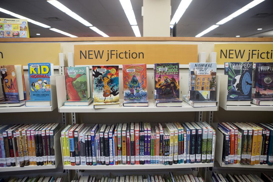 Junior fiction novels rest on shelves at the Iowa City Public Library in Iowa City on Tuesday, February 5, 2019. 