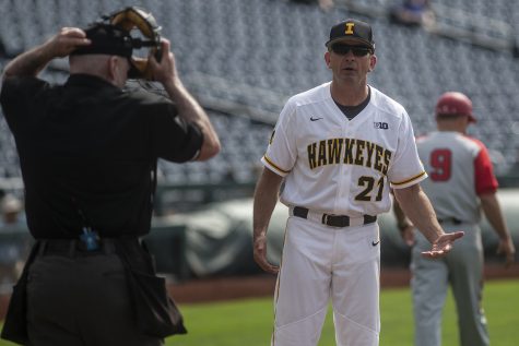 Iowa Head Coach Rick Heller questions the Home Plate Umpire during Iowas Big Ten tournament game against Ohio State on Thursday, May 24, 2018. The Buckeyes defeated the Hawkeyes 2-0. (Nick Rohlman/The Daily Iowan)