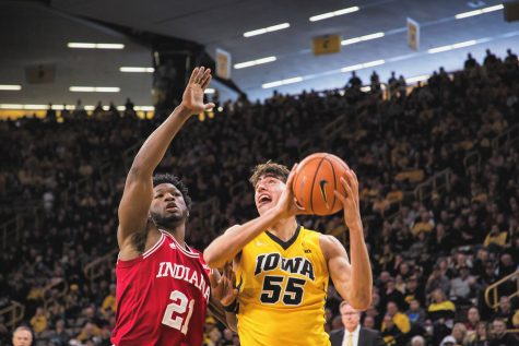 Iowa forward Luka Garza controls the ball during a game against Indiana University at Carver-Hawkeye Arena on Saturday, Feb. 17, 2018. The Hoosiers defeated the Hawkeyes 84 to 82. 