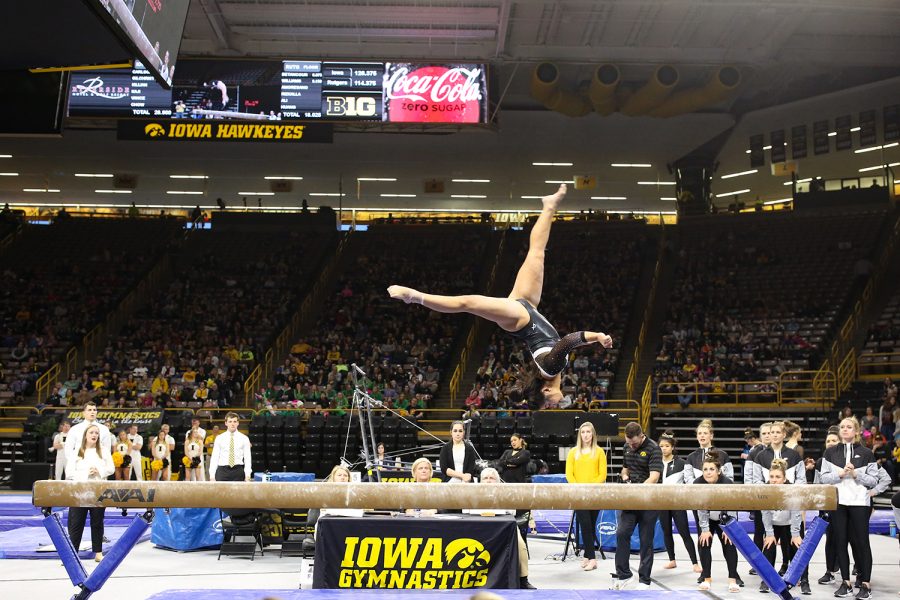 Iowa Gymnast Clair Kaji performs on the balance beam during a gymnastics meet against Rutgers on Saturday, Jan. 26, 2019. The Hawkeyes defeated the Scarlet Knights 194.575 to 191.675. 