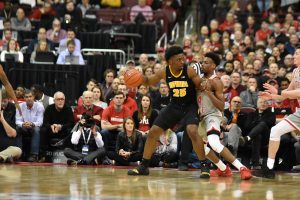 Tyler Cook dribbles in the post during Ohio States 90-70 win over No. 22 Iowa on Feb. 26 (Cori Wade/The Lantern).