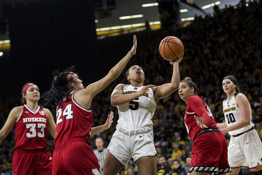 Iowa guard Alexis Sevillian goes up for a lay-up to  during the womens basketball game against Nebraska at Carver-Hawkeye Arena on Sunday, Jan. 28, 2018. The Cornhuskers defeated the Hawkeyes 92-74.  (Chris Kalous/The Daily Iowan)