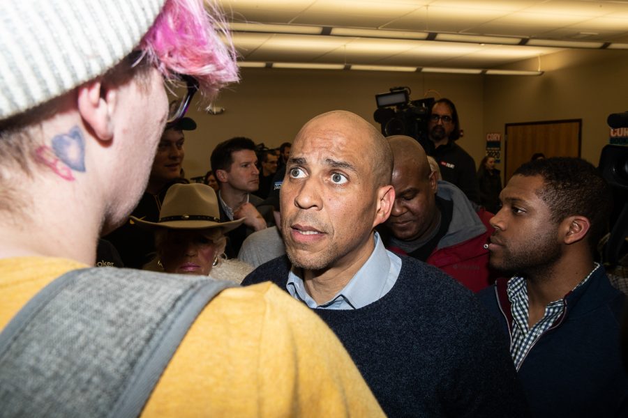 Presidential candidate Cory Booker listens to a member of the audience following a community forum at at the African American Museum of Iowa in Cedar Rapids on Friday, February 8, 2019. New Jersey Senator Cory Booker announced his bid for President on February 1, 2019.