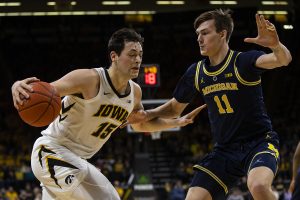 Iowa forward Ryan Kriener drives to the hoop during the Iowa/Michigan mens basketball game at Carver-Hawkeye Arena on Friday, February 1, 2019. The Hawkeyes took down the No. 5 ranked Wolverines, 74-59. 