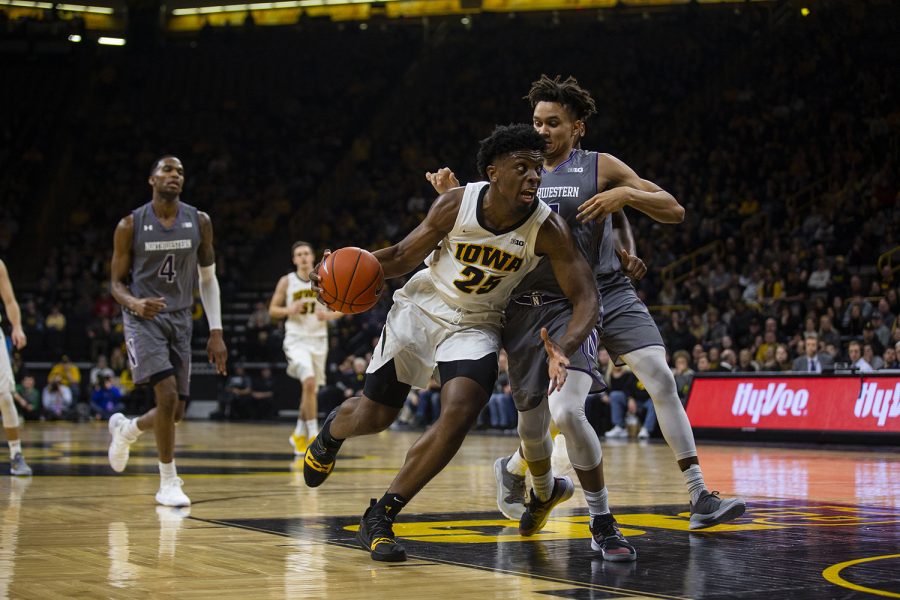 Iowa forward Tyler Cook drives to the basket during the Iowa/Northwestern men's basketball game at Carver-Hawkeye Arena on Sunday, February 10, 2019. The Hawkeyes defeated the Wildcats, 80-79.