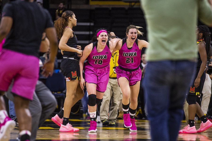 Iowa center Megan Gustafson and Iowa forward Hannah Stewart celebrate the win during women's basketball vs. Maryland at Carver-Hawkeye Arena on Sunday, February 17, 2019. The Hawkeyes defeated the Terrapins 86-73. 