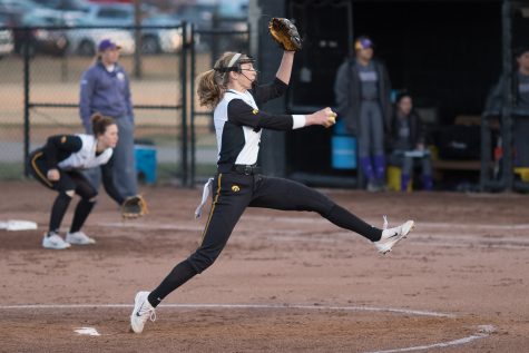 University of Iowa softball player Allison Doocy winds up to pitch during a game against Western Illinois University on Tuesday, Apr. 17, 2018. The Fighting Leathernecks defeated the Hawkeyes 2-1.