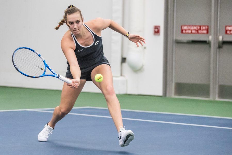 Iowa's Ashleigh Jacobs hits a forehand during a women's tennis match between Iowa and Penn State at the HTRC on Sunday, February 24, 2019. The Hawkeyes fell to the Nittany Lions, 4-3.