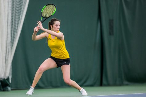 Iowas Samantha Mannix hits a forehand during a womens tennis matchup between Iowa and Iowa State at the Hawkeye Tennis and Recreation Complex on Friday, February 8, 2019.  The Hawkeyes dropped the doubles point but swept singles matches, defeating the Cyclones 4-1.