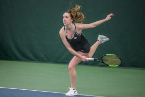Iowas Samantha Mannix hits a serve during a womens tennis match between Iowa and Penn State at the HTRC on Sunday, February 24, 2019. The Hawkeyes fell to the Nittany Lions, 4-3.