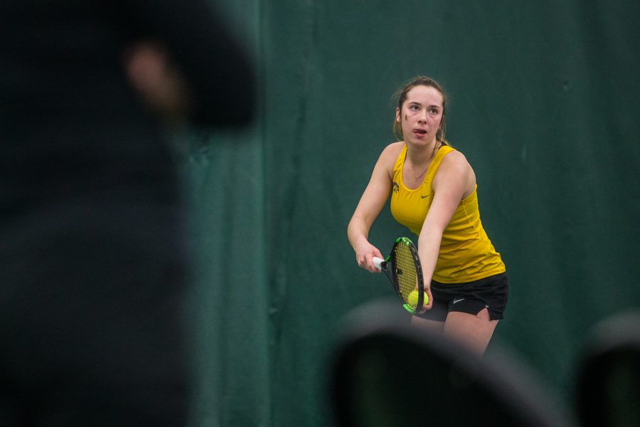 Iowas Samantha Mannix prepares to serve during a womens tennis matchup between Iowa and Iowa State at the Hawkeye Tennis and Recreation Complex on Friday, February 8, 2019.  
