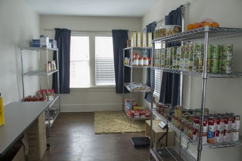 Nonperishable foods are stored in shelving on Tuesday, Feb. 26, 2019. The newest branch of the UI Food Pantry is located in the upstairs of the LGBTQ Resource Center.
