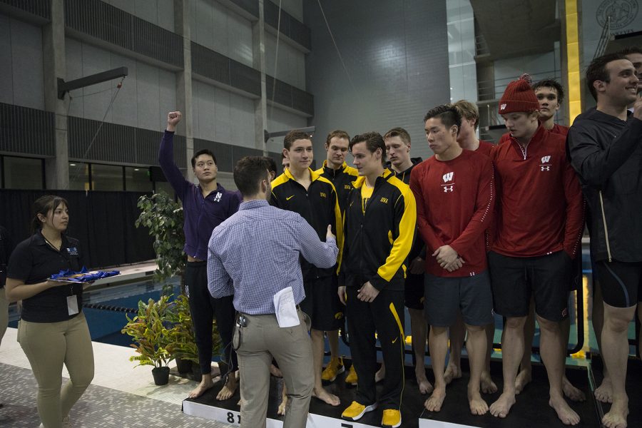 Kenneth Mende, Daniel Swanepoel, Michael Tenney, and Joseph Myhre receiving recognition for Mens 400 Yard Medley Relay on Thursday, February 28, 2019. The Big Ten Mens Swimming and Diving Championship was held at the University of Iowa Aquatic Center. 