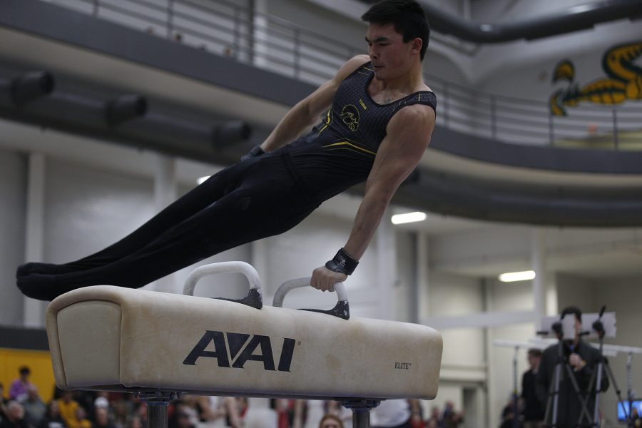 Addison Chung competes on the pommel horse during the meet against Nebraska at the UI Field House on Saturday, March 2, 2019. Chung took home a career best on this event with a 13.300. Iowa took the victory with a score of 406.500 over Nebraska with a score of 403.550.