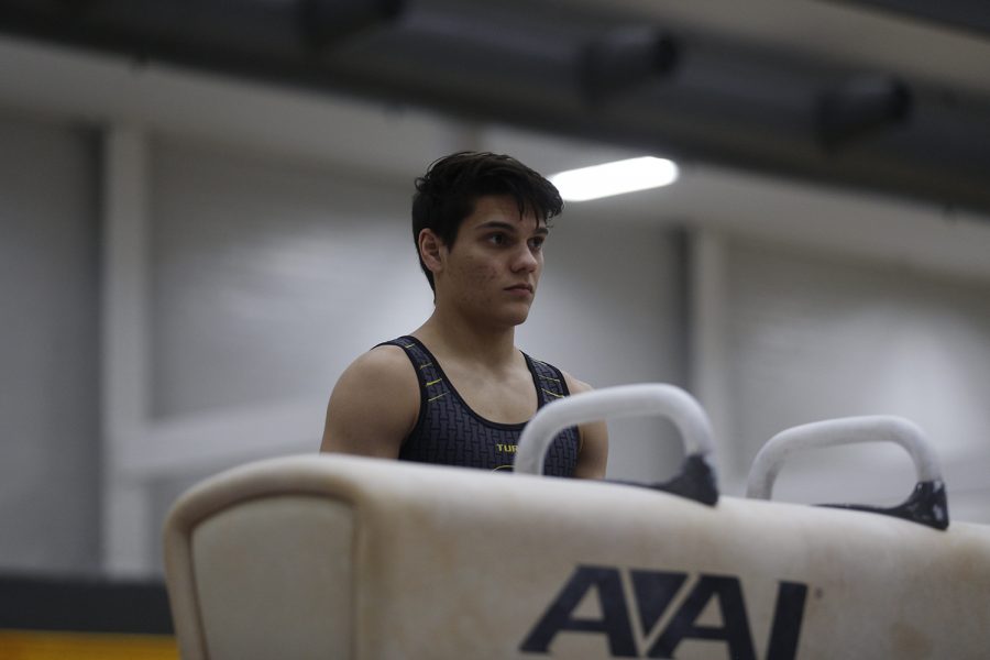 Evan Davis prepares to compete on the pommel horse during the meet against Nebraska at the UI Field House on Saturday, March 2, 2019. Iowa took the victory with a score of 406.500 over Nebraska with a score of 403.550.