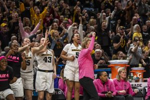 Iowa players and fans cheer during the women's Big Ten tournament basketball game vs. Rutgers at Bankers Life Fieldhouse on Saturday, March 9, 2019. The Hawkeyes defeated the Scarlet Knights 72-67 and will be moving on to the championship game against Maryland.