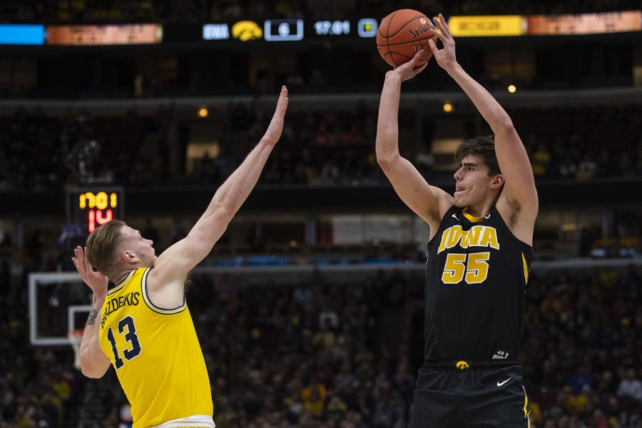 Iowa forward Luka Garza attempts a shot during the Iowa/Michigan Big Ten Tournament men's basketball game in the United Center in Chicago on Friday, March 15, 2019. The Wolverines defeated the Hawkeyes, 74-53. 