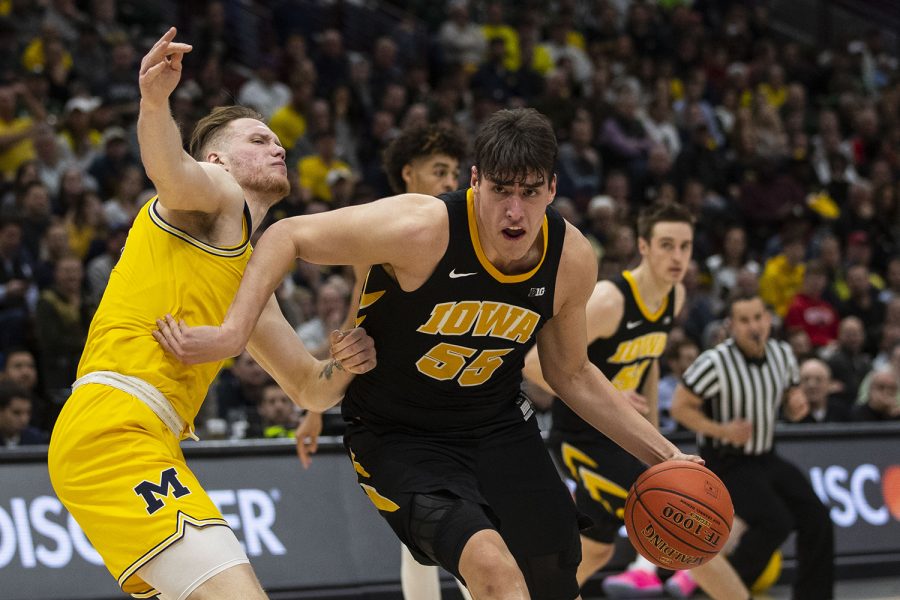 Iowa forward Luka Garza drives to the basket during the Iowa/Michigan Big Ten Tournament mens basketball game in the United Center in Chicago on Friday, March 15, 2019. The Wolverines defeated the Hawkeyes, 74-53. 