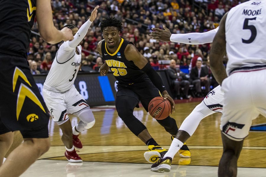 Iowa forward Tyler Cook drives the ball during the NCAA game against Cincinnati at Nationwide Arena on Friday, March 22, 2019. The Hawkeyes defeated the Bearcats 79-72.