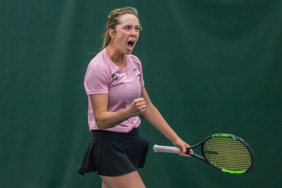 Iowa's Samantha Mannix celebrates a point during a women's tennis match between Iowa and Purdue on Friday, March 29, 2019. The Hawkeyes defeated the Boilermakers, 4-1.