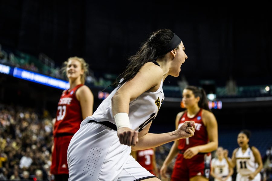 Iowa center Megan Gustafson celebrates a basket during the NCAA Sweet 16 game against NC State at the Greensboro Coliseum Complex on Saturday, March 30, 2019. The Hawkeyes defeated the Wolfpack 79-61.