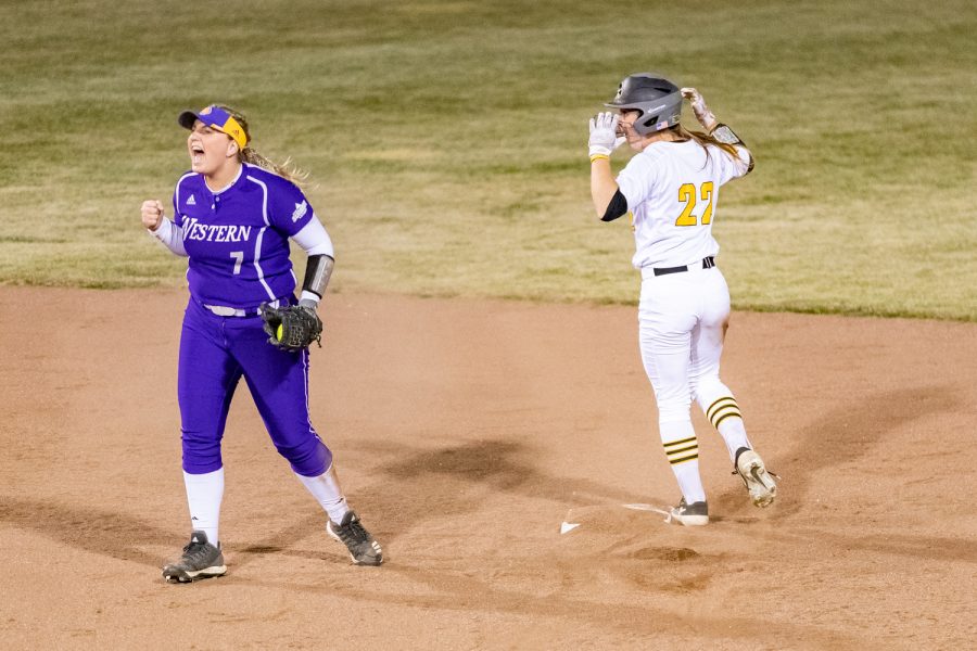 Western Illinois Halle Hollatz celebrates as Iowas Hallie Ketcham is called out at second during a softball game on Wednesday, Mar. 27, 2019. The Fighting Leathernecks defeated the Hawkeyes 10-1. 