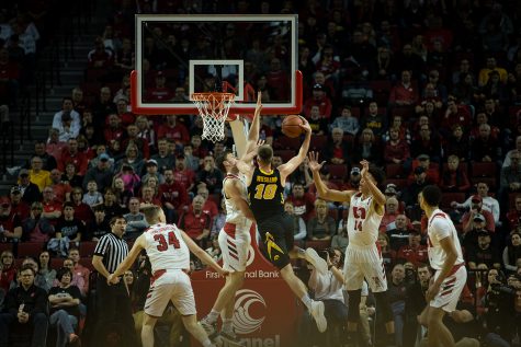 Iowa Forward Luka Garza #55 takes a layup during a mens basketball game between the Iowa Hawkeyes and the Huskers at Pinnacle Bank Arena on Sunday, March 10, 2019. The Hawkeyes fell in overtime to the Huskers, 93-91.