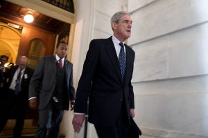 Former FBI Director Robert Mueller, front, the special counsel probing Russian interference in the 2016 U.S. election, leaves the Capitol building after meeting with the Senate Judiciary Committee on Capitol Hill on June 21, 2017, in Washington, D.C. (Ting Shen/Xinhua/Zuma Press/TNS)