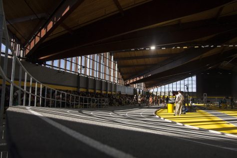 Competitors line up during the Border Battle indoor track meet in the UI Recreation Building with Iowa, Missouri and Illinois competing on Saturday, Jan. 7, 2017. The Hawkeye women defeated Missouri and Illinois, 105-33 and 96-51 respectively, while the men defeated Missouri, 107-27 and fell to Illinois, 85-74. 