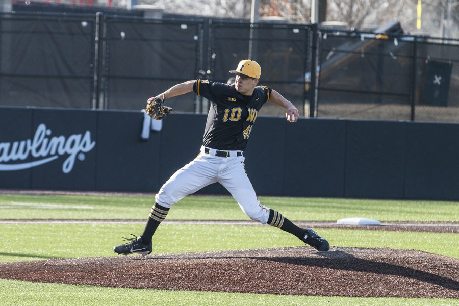 Iowa pitcher Kyle Shimp prepares to throw the ball during men's baseball Iowa vs. Loras at Duane Banks Field on March 21, 2018. The Hawkeyes defeated the Duhawks 6-4. 