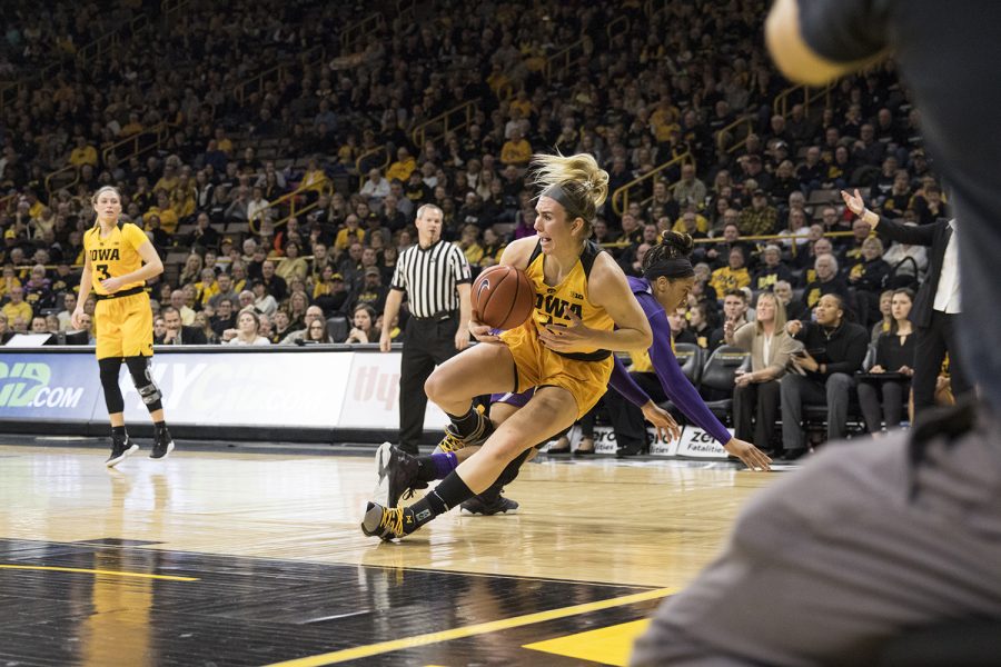 Senior Hannah Stewart defends the basket during womens basketball against Northwestern in Carver-Hawkeye Arena on March 3, 2019. Iowa defeated Northwestern 74-50. (Katie Goodale/The Daily Iowan)