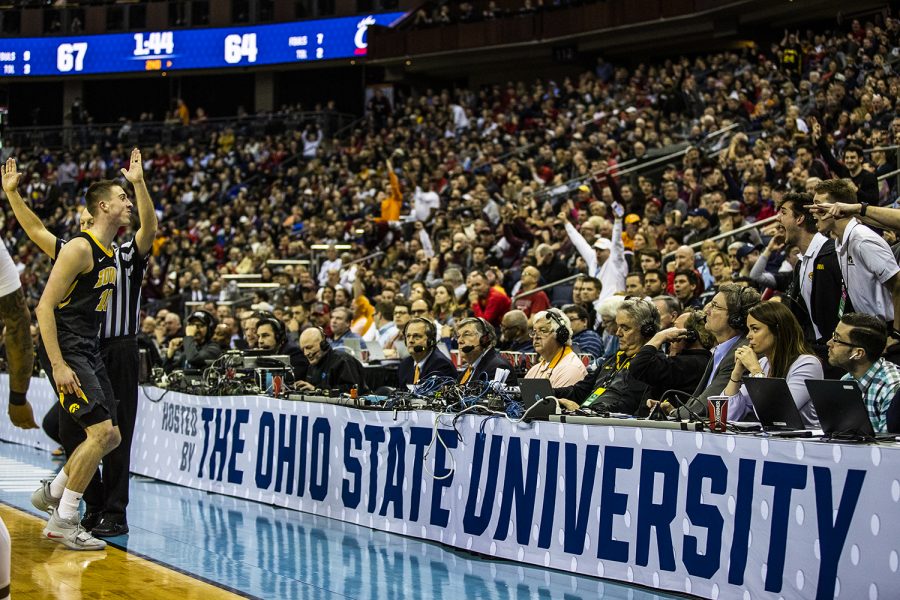 Fans cheer after Iowa guard Joe Wieskamp shoots a three-pointer in the last few minutes of the NCAA game against Cincinnati at the Nationwide Arena on Friday, March 22, 2019. The Hawkeyes defeated the Bearcats 79-72. (Katina Zentz/The Daily Iowan)