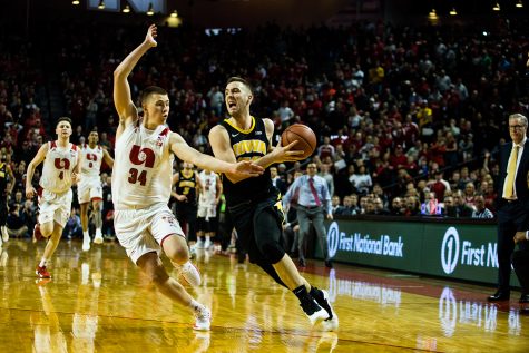 Iowa Guard Conner McCaffery #30 dribbles down the court during a mens basketball game between the Iowa Hawkeyes and the Nebraska Huskers at Pinnacle Bank Arena on Sunday, March 10, 2019. The Hawkeyes fell in overtime to the Huskers, 93-91.