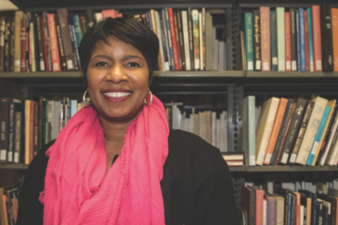 UI Associate Professor Katrina Sanders poses for a portrait in the Main Library on March 13. Sanders is working on the book The Rise and Fall of Black Catholic Education in a Changing South.