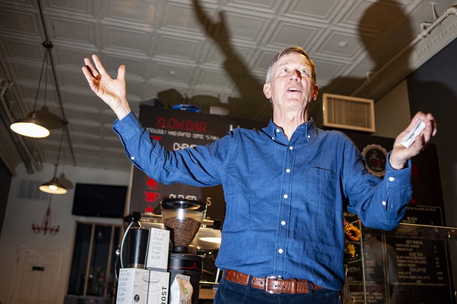 Former Colorado Gov. John Hickenlooper speaks during a campaign stop at the 392 Caffé in Clinton, Iowa on Saturday, March 9, 2019.