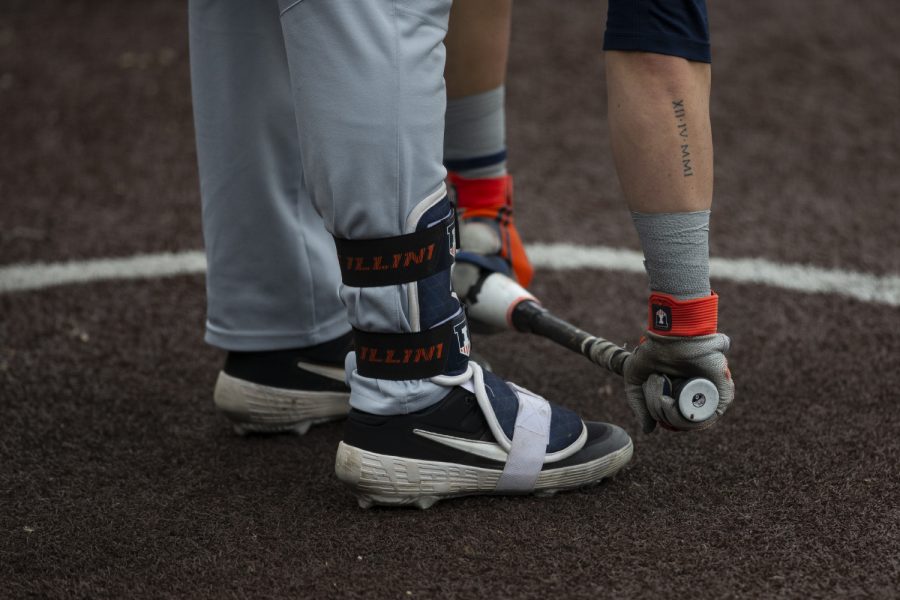 An Illinois player stretches before his at bat. The Hawkeyes defeated the Illini 8-4 at Duane Banks Field on Mar 29, 2019.