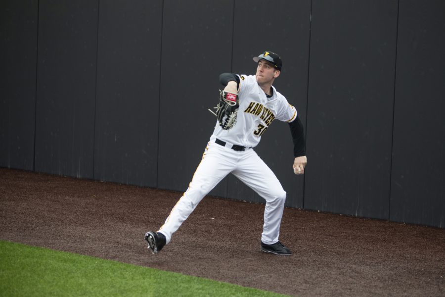 Iowa right fielder Connor McCaffery throws in a ball from the outfield. The Hawkeyes defeated the Illini 8-4 at Duane Banks Field on Mar 29, 2019. 