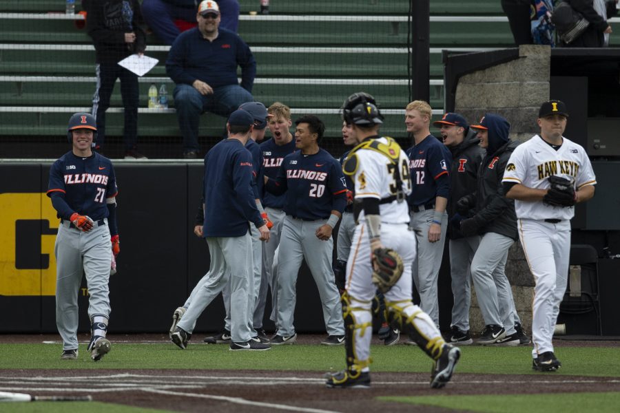 Illinois players celebrate their teammate scoring. The Hawkeyes defeated the Illini 8-4 at Duane Banks Field on Mar 29, 2019.