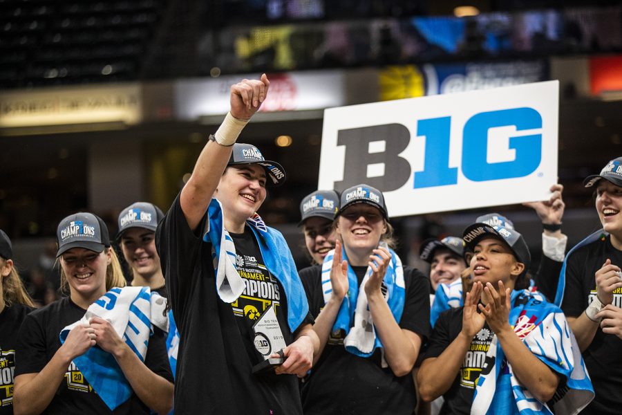 Iowa center Megan Gustafson smiles after receiving the Most Outstanding Player in the Big Ten Tournament during the womens Big Ten Championship basketball game vs. Maryland at Bankers Life Fieldhouse on Sunday, March 10, 2019. The Hawkeyes defeated the Terrapins 90-76 and are the Big Ten champions.