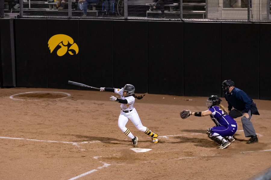 Iowa Lea Thompson connects on a triple during a softball game against Western Illinois on Wednesday, Mar. 27, 2019. The Fighting Leathernecks defeated the Hawkeyes 10-1. (David Harmantas/The Daily Iowan)