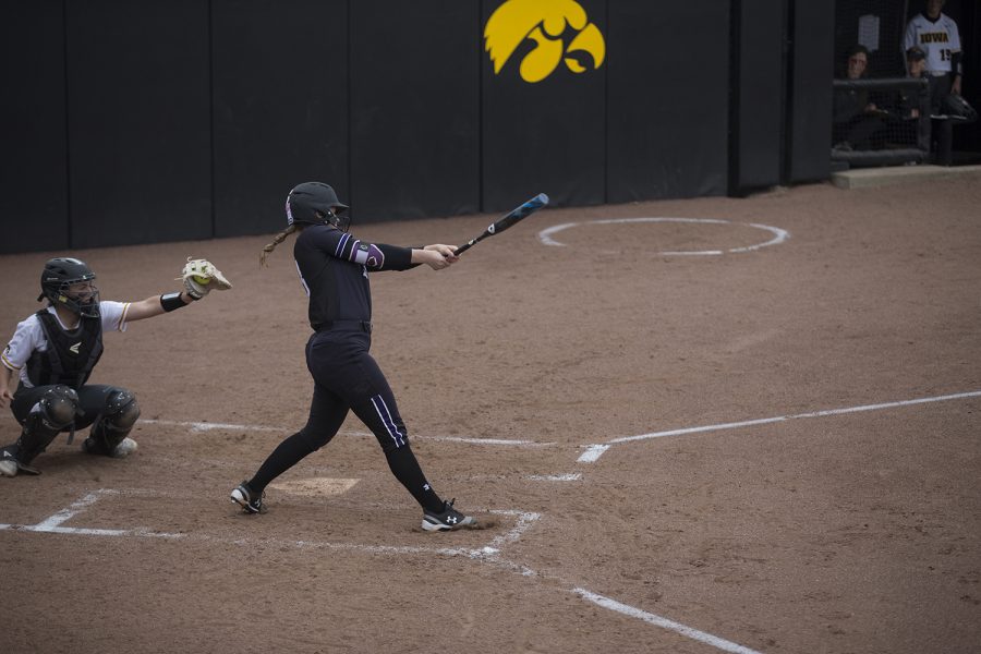 Northwestern pitcher Megan Newport strikes out during the conference opening softball game at Pearl Field on Friday, March 29, 2019. The Wildcats defeated the Hawkeyes 5-1. 