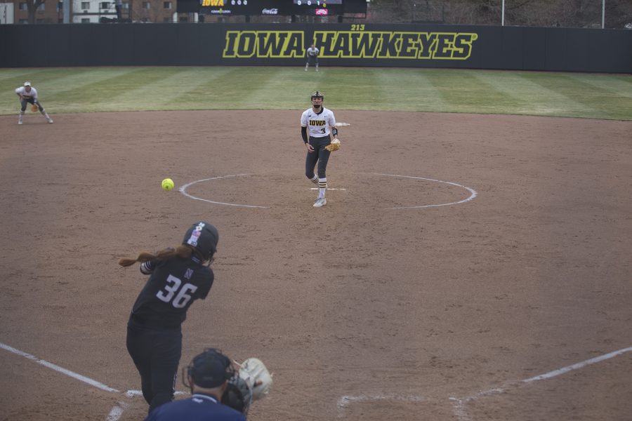 Northwestern utility player Jordyn Rudd hits a single to left field during the conference opening softball game at Pearl Field on Friday, March 29, 2019. The Wildcats defeated the Hawkeyes 5-1. 