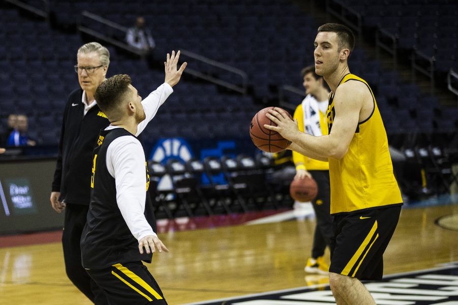 Iowa guard Jordan Bohannon defends Iowa guard Connor McCaffery during the Iowa basketball practice at Nationwide Arena in Columbus, Ohio on Thursday, March 21, 2019. The Hawkeyes will compete against the Cincinnati Bearcats tomorrow in the NCAA Tournament.